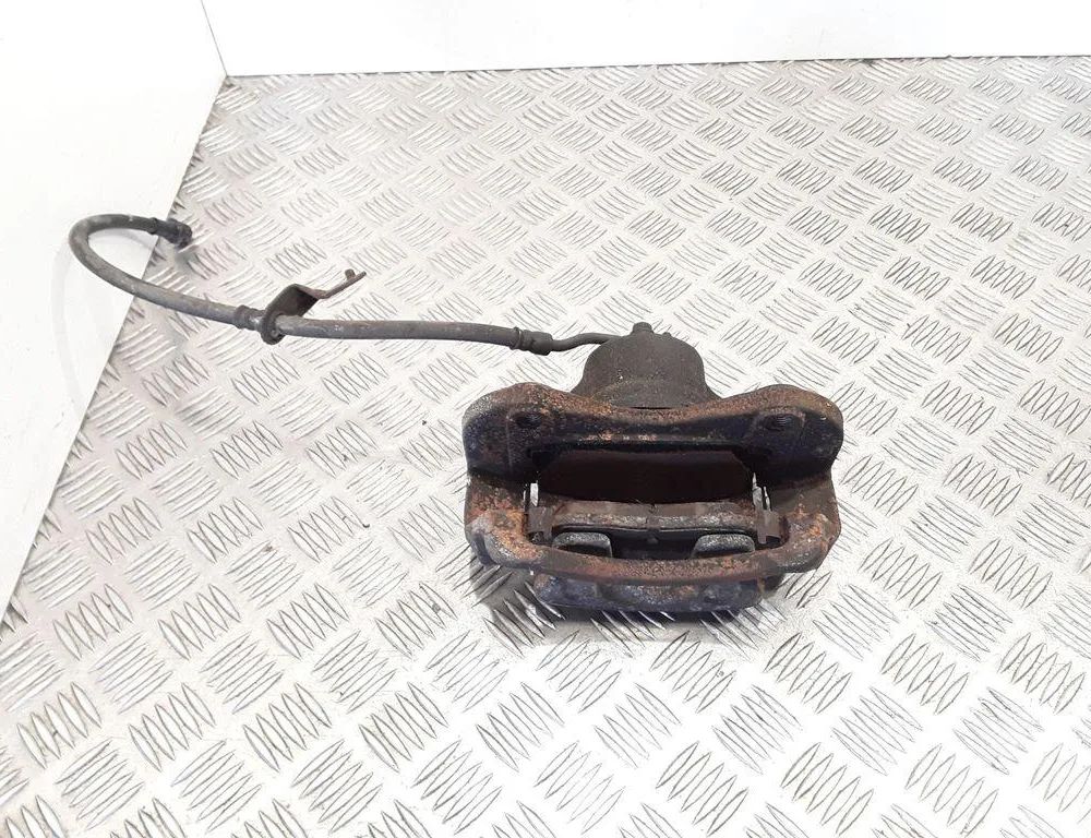 HYUNDAI ix35 1 generation (2009-2015) Étrier de frein avant gauche 32860037