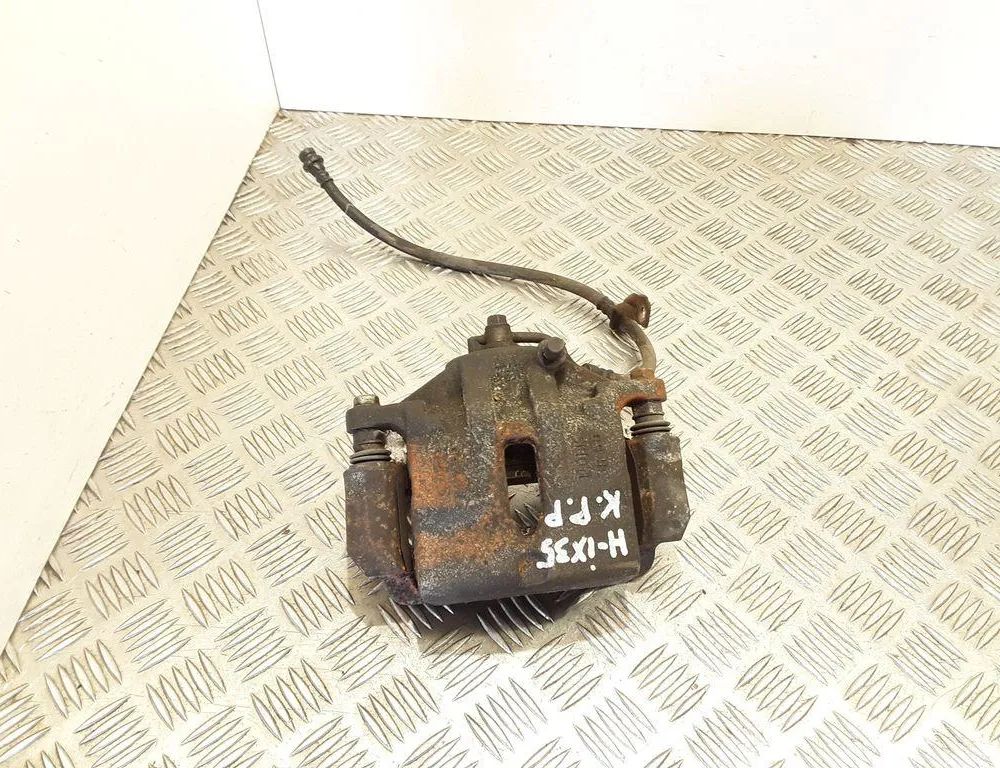 HYUNDAI ix35 1 generation (2009-2015) Étrier de frein avant gauche 32860037