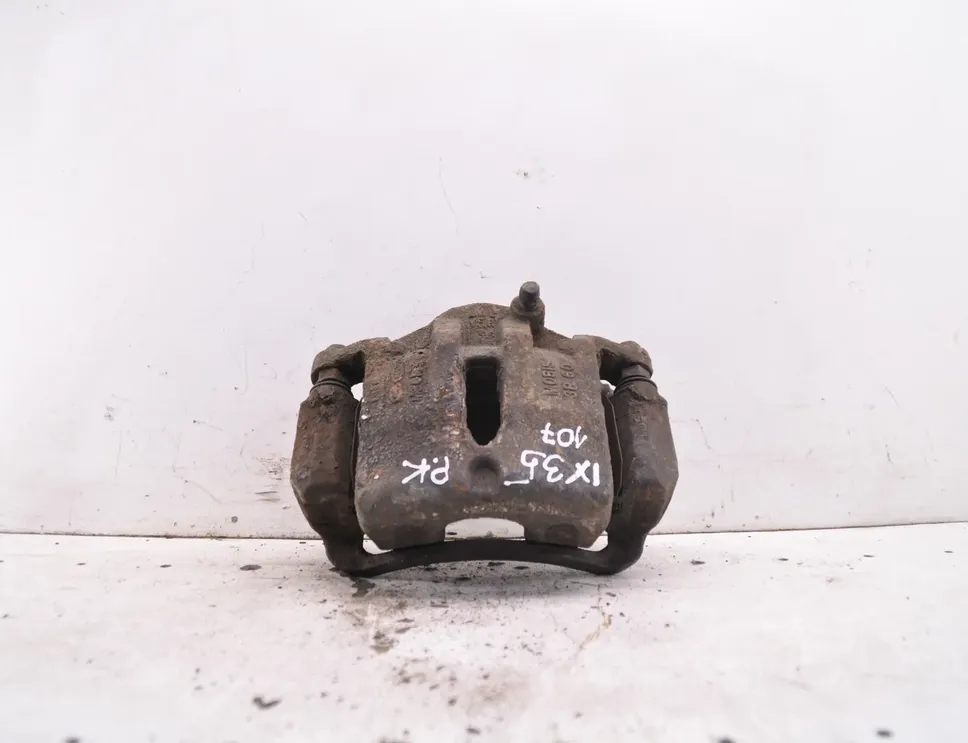 HYUNDAI ix35 1 generation (2009-2015) Étrier de frein avant gauche 34855676